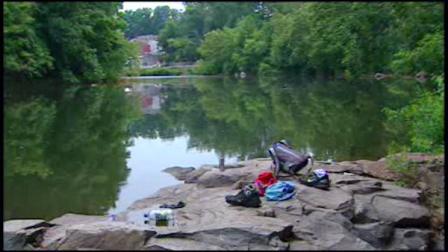 A teenagers belongings are shown near the Brandywine River where he was rescued by bystanders and taken to the hospital in critical condition on July 7, 2011.
