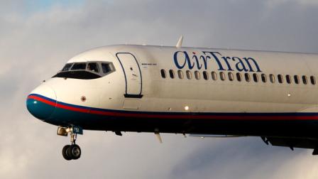 In this Friday, Oct. 29, 2010 photo, an AirTran jet airplane approaches Philadelphia International Airport in Philadelphia.