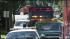 Crews search for a worker who was swept into a...