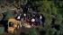 Crews search for a worker who was swept into a...