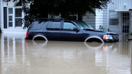 Floodwaters from the Susquehanna River partially submerge a home and SUV, Friday, Sept. 9, 2011, in West Pittston, Pa. Days of rainfall from what had been Tropical Storm Lee inundated a wide portion of Pennsylvania and other northeastern states Thursday, pouring into basements and low-lying homes and forcing tens of thousands of people to seek higher ground. At least seven were left dead.