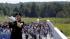 First Sgt. Robert Baranik plays Taps following a...