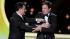 Jimmy Kimmel, left, and Jimmy Fallon present the...