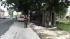 The truck overturned on to the sidewalk,...