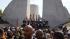 Audience members await the arrival of President...