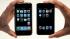 The new Apple iPhone, left, is shown in front of...