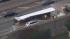 Overturned tractor trailer shut down part of...