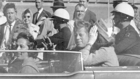 President John F. Kennedy rides in a motorcade with his wife Jacqueline moments before he was shot and killed in Dallas, Tx., Nov. 22, 1963. Texas Governor and Mrs. John Connally are also in the car.