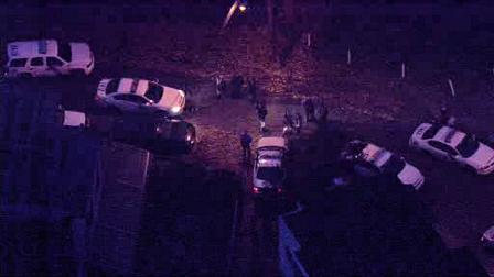 Crash ends with car on train tracks; 2 hurt