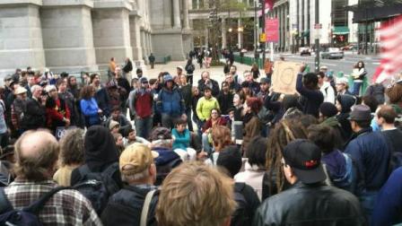 Members of Occupy Philadelphia meet on Dilworth Plaza as the eviction deadline ticks to an hour away on Sunday, November 27, 2011.