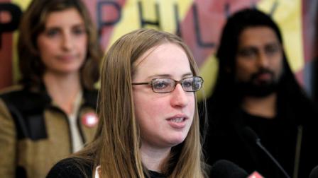 Gwen Snyder, center, speaks as Anne Gemmell political director for Fight for Philly, left, and University of Pennsylvania professor TJ Ghose stand behind her during a news conference Friday, Dec. 2, 2011, in Philadelphia. Occupy Philadelphia protesters say their movement has not ended despite their eviction from the City Hall plaza where they had been encamped for nearly two months. (AP Photo/Matt Rourke)