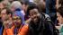 Director Spike Lee, left, sits beside comedian...