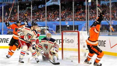 Philadelphia Flyers Brayden Schenn, right, and Jakub Voracek, left, of Czech Republic, celebrate after Schenns goal past New York Rangers Ryan McDonagh (27) and Henrik Lundqvist (30), of Sweden, in the second period of the NHL Winter Classic hockey game, Monday, Jan. 2, 2012, in Philadelphia. (AP Photo/Tom Mihalek)