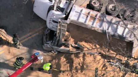SUV crushed by dump truck in Cherry Hill