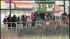 As crowds watched from the boardwalk, volunteers...