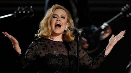 Adele performs during the 54th annual Grammy Awards on Sunday, Feb. 12, 2012 in Los Angeles. (AP Photo/Matt Sayles)