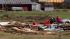 Family and friends begin the task of clean-up...