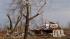 Violent storms kill at least 34 in 4 states :: Residents of Marysville, Ind., survey the tornado damage to their homes Friday, March 2, 2012 in Marysville, Ind. (AP Photo/Brian Bohannon)
