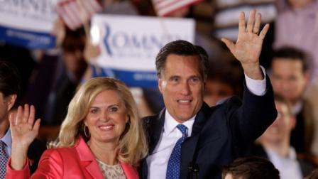 Republican presidential candidate, former Massachusetts Gov. Mitt Romney and his wife Ann wave to supporters at his Super Tuesday campaign rally in Boston, Tuesday night, March 6, 2012. (AP Photo/Stephan Savoia)