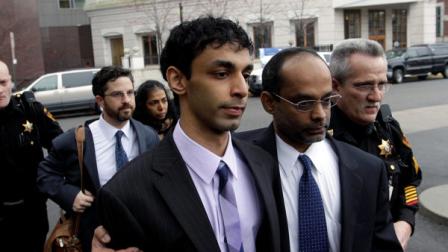 As defense attorney Philip Nettl, second left, follows, Dharun Ravi, center, is helped by his father, Ravi Pazhani, second right, as they leave court in New Brunswick, N.J., Friday, March 16, 2012. Ravi, a former Rutgers University student accused of using a webcam to spy on his gay roommates love life has been convicted of bias intimidation and invasion of privacy. A jury found that he used a webcam to spy on roommate Tyler Clementi. Within days, Clementi realized he had been watched and jumped to his death from New Yorks George Washington Bridge in September 2010.