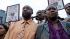 Trayvon Martins parents Tracy Martin, left, and...