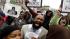 Demonstrators chant Trayvon Martins name during...