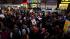 Demonstrators march after a rally for Trayvon...