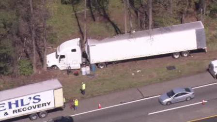 Tractor-trailer veers off New Jersey Turnpike in crash