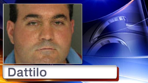 Philadelphia police officer charged with fondling teen at motel
