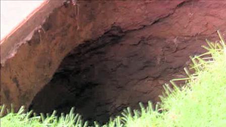Sinkhole in yard of historic Doylestown, Pa. home
