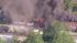 Crews battle a multi-alarm fire in Coatesville,...