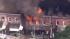 Crews battle a multi-alarm fire in Coatesville,...