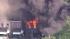 Crews battle a multi-alarm fire in Coatesville,...
