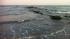 Rescue crews and the Coast Guard search for a...