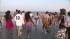 Rescue crews and the Coast Guard search for a...