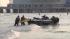 Rescue crews and the Coast Guard search for a...