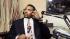Rodney G. King listens to a call during a radio...