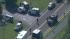Chopper 6 over the scene of a barricade...