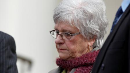 Dottie Sandusky, wife of Jerry Sandusky, stands as her husband speaks to the media at the Centre County Courthouse after a bail conditions hearing Friday, Feb. 10, 2012 in Bellefonte, Pa. (AP Photo/Alex Brandon)