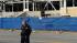 A Penn State University police officer stands in...