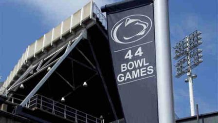 A banner celebrating the 44 bowl games that the Penn State football team has played in hangs outside of Beaver Stadium on the Penn State University main campus in State College, Pa., Monday, July 23, 2012. (AP Photo/Gene J. Puskar)