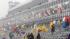 Fans leave the stands after the start of the...