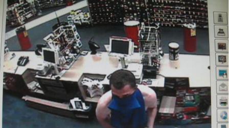 Surveillance photos of suspect wanted in CVS robbery