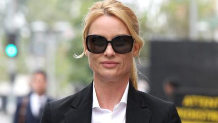 FILE - In this March 13, 2012 file photo, Desperate Housewives star, Nicollette Sheridan arrives at court in Los Angeles. An appeals court in Los Angeles ruled Thursday August 16, 2012 that Sheridan is not entitled to a new trial on her claim that she was wrongfully fired from the series Desperate Housewives, but that she should be allowed to pursue a claim she was retaliated against for complaining about an unsafe work condition. (AP Photo/Nick Ut, file)