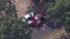 Police say a fleeing bank robber crashed his...