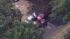Police say a fleeing bank robber crashed his...