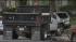 The driver of a dump truck was arrested after...