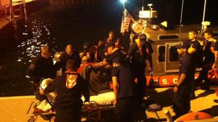 A boat crew from Coast Guard Station Cape May, N.J., transfers to local EMS personnel a man who went overboard when his kayak overturned near the entrance of Delaware Bay Sunday, Sept. 30, 2012. The 65-year-old man was wearing his life jacket. U.S. Coast Guard photo by Petty Officer 3rd Class Jonathan Stilp