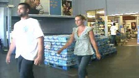 Police say the man and woman pictured in this surveillance photo stole a purse from a car parked in the unit block of Chanticleer Circle in Camden-Wyoming, Delaware.