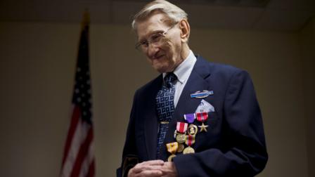 World War II Army Veteran and Drexel Hill resident Montraville Lybrand pauses, at Rep. Patrick Meehan R-Pa., offices during his medal pinning ceremony, Friday, Oct. 12, 2012, in Springfield, Pa. Meehan helped to obtain medals including the Bronze Star that Lybrand did not receive for his service during World War II. (AP Photo/Matt Rourke)